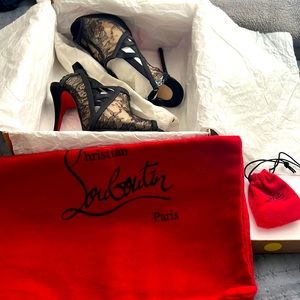 Christian Louboutin black lace heel.